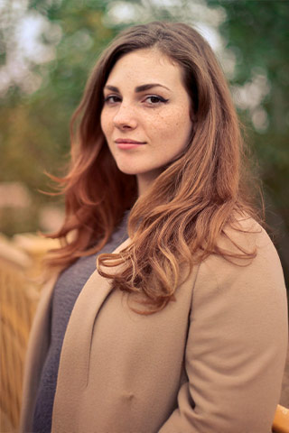 Woman smiling outdoors